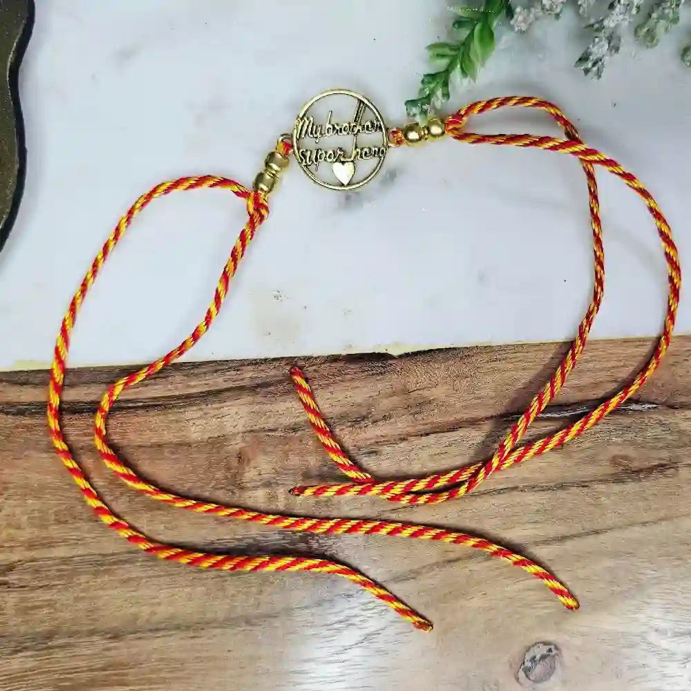 Shop gold metal rakhi for brother