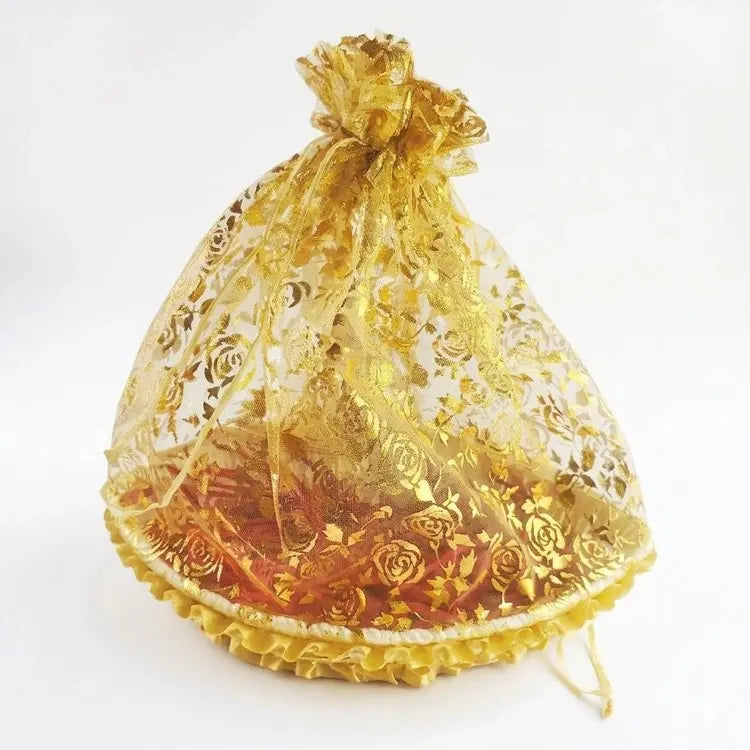 Buy Holi hamper with pichkari and sweets
