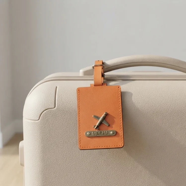 Luggage tag with name and charm