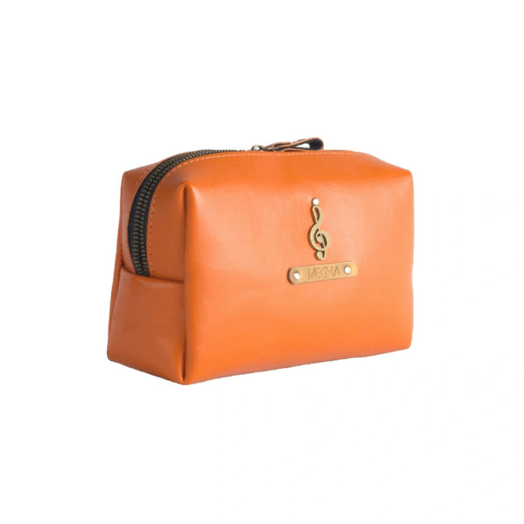 Order personalized travel pouch in orange with custom charm and custom name tag