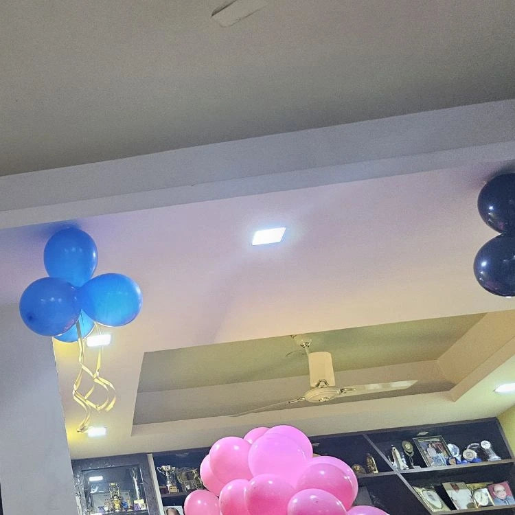Book birthday ceiling balloon decoration at home with blue and pink balloons
