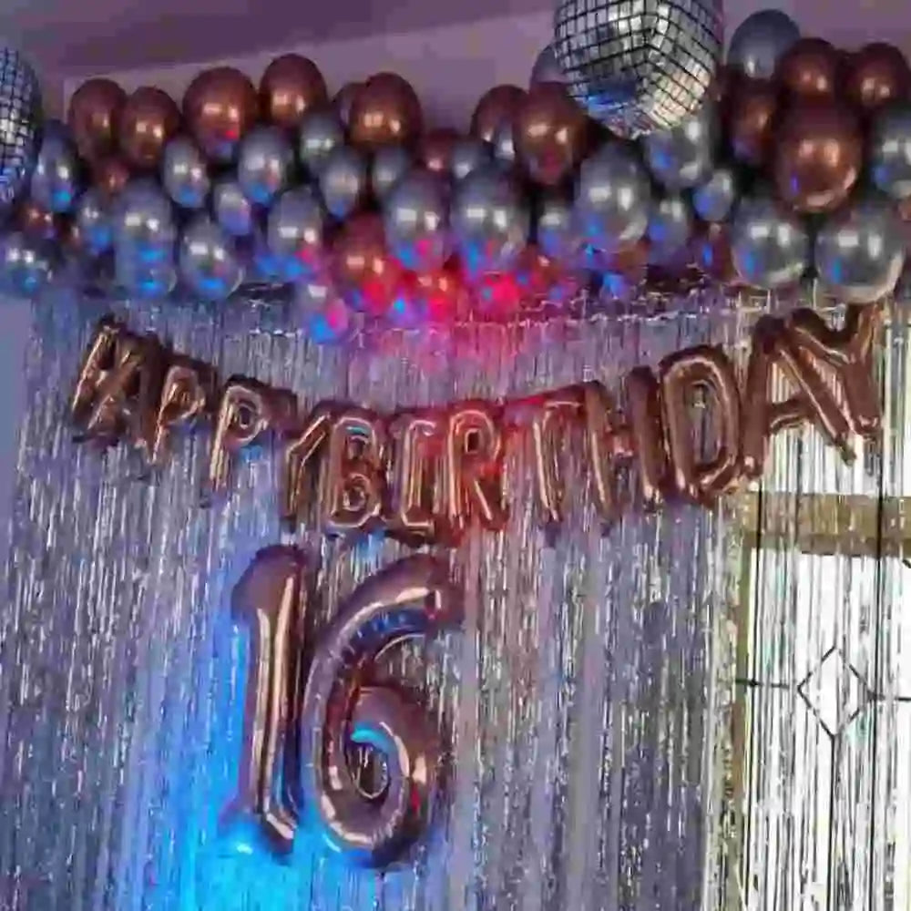 Birthday disco theme balloon decor with fringe backdrop