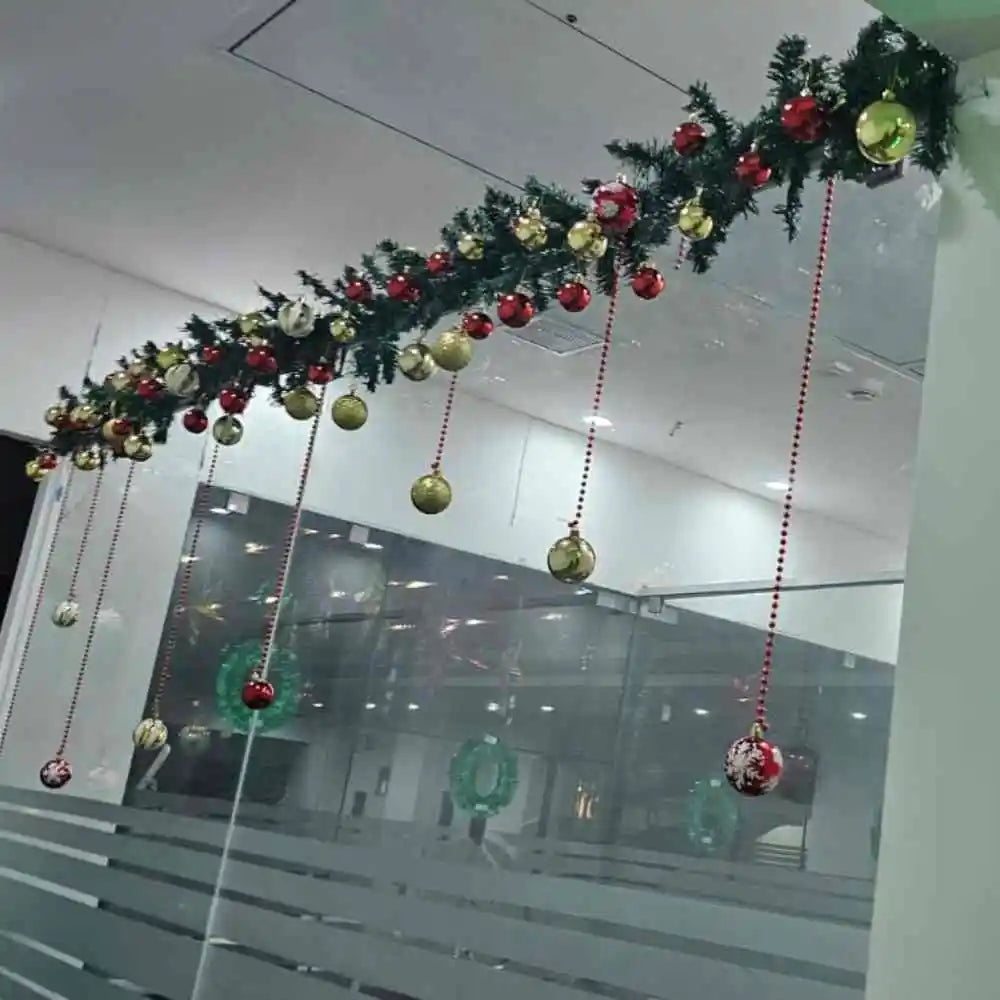 Get Christmas ceiling decor for office with hanging garlands and ornaments