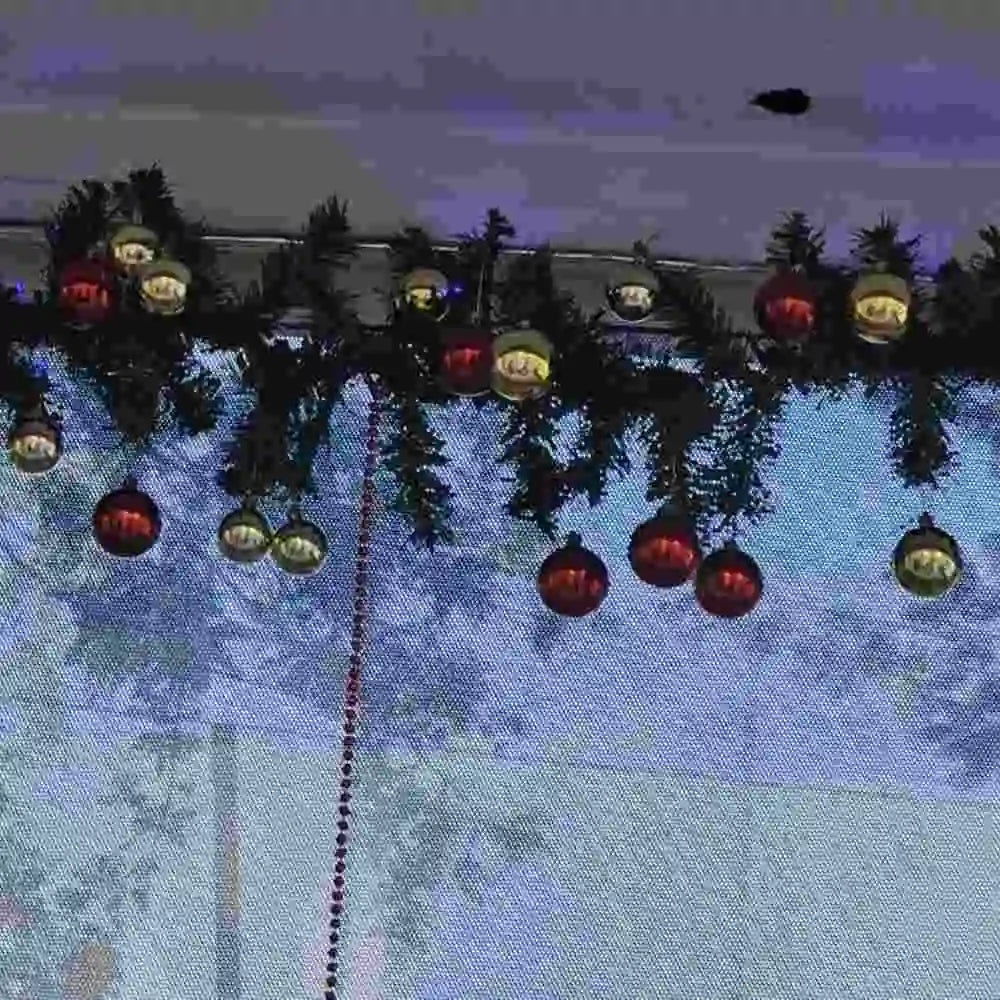 Enquire for Christmas office wall decoration with garlands and hanging ornaments