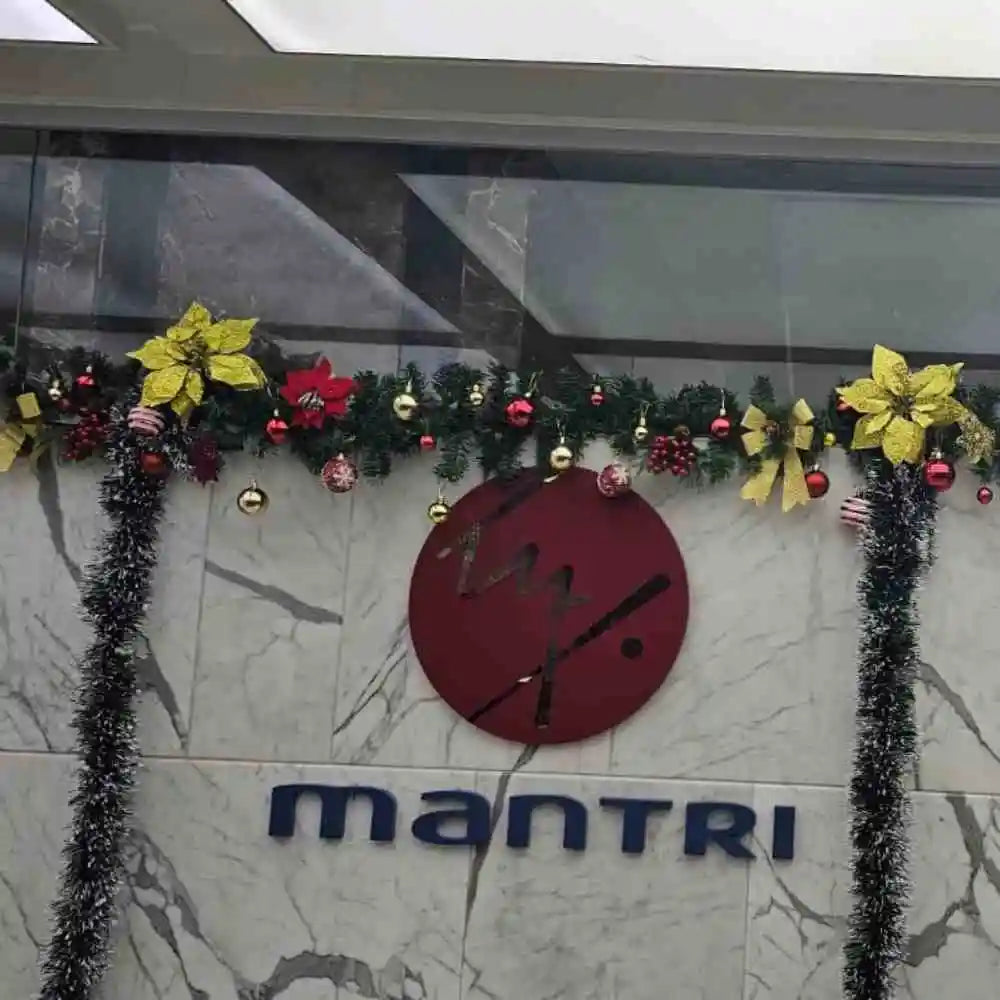 Book Christmas wall decoration for office with garlands and wreath accents