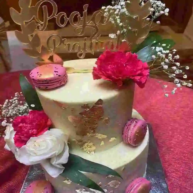 Purchase Custom engagement cake with floral decorations and personalized topper in Bangalore