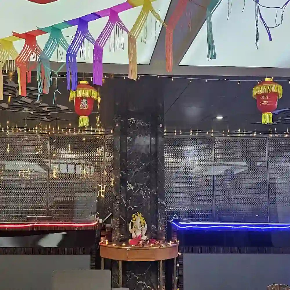Get Diwali Decor in Office with colourful ceiling hangings, traditional lanterns and festive lighting
