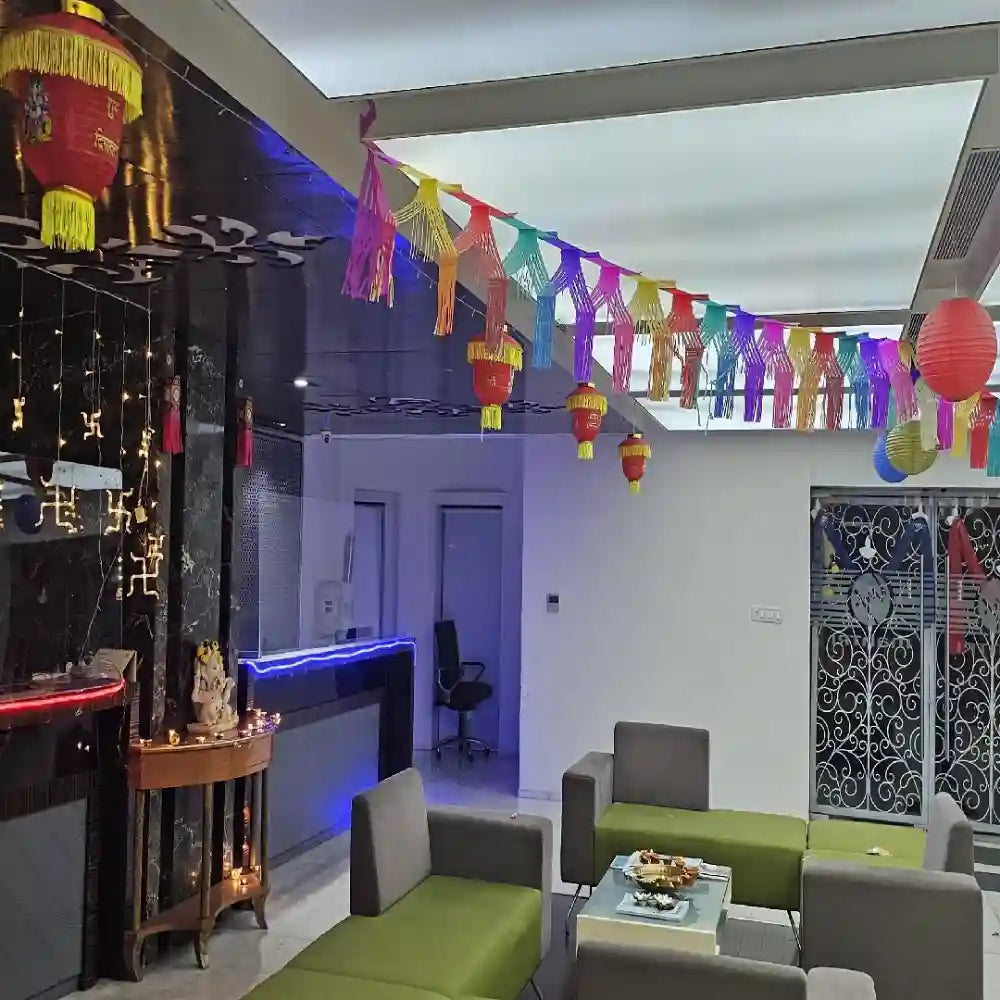 Book Diwali Decor in Office with colourful paper hangings, traditional lanterns, and festive lights
