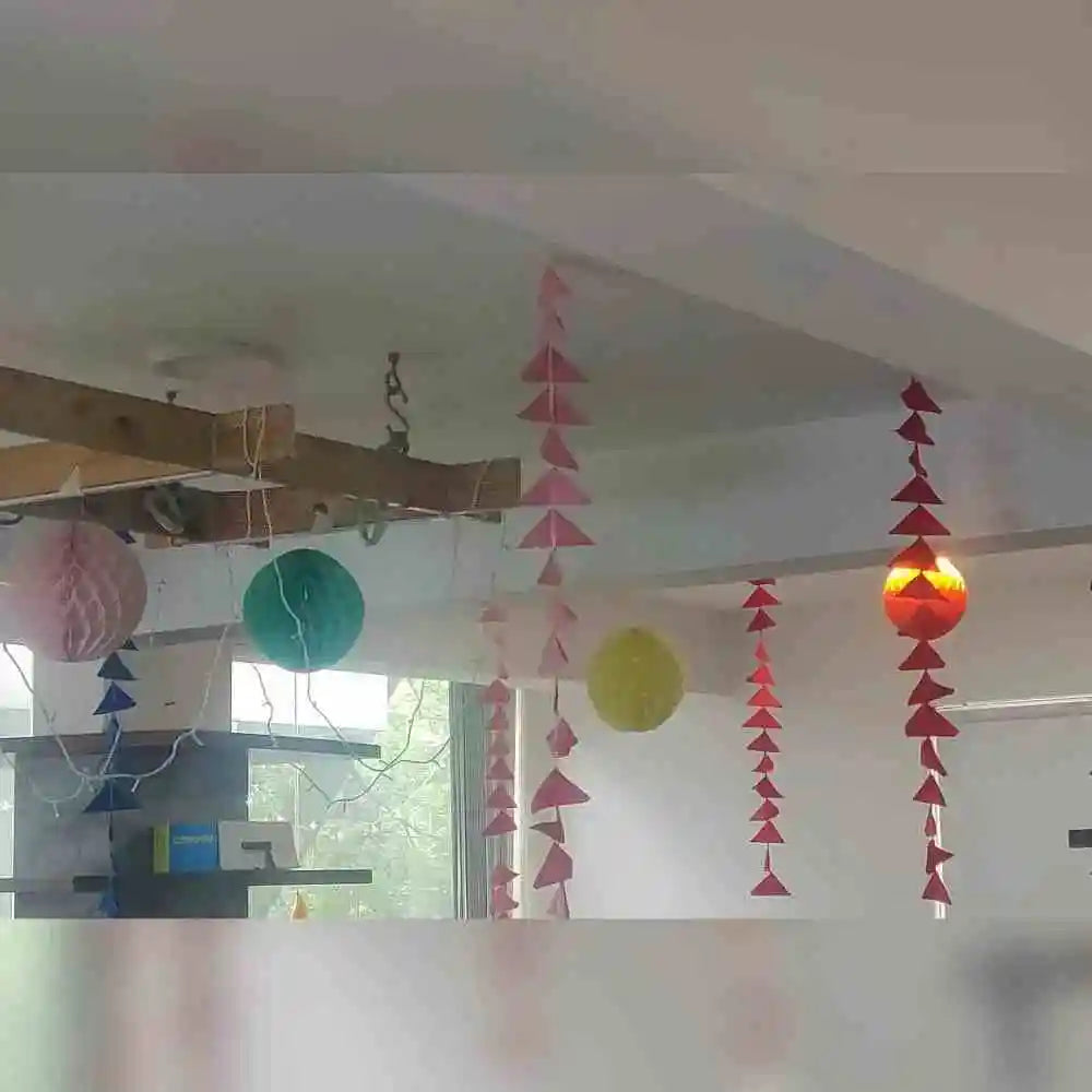 Order Diwali Decor in Office with colourful paper streamers, hanging lanterns and ceiling decorations