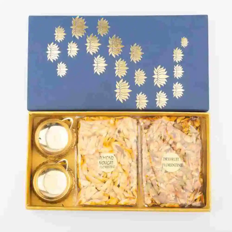 Order Dry Fruit Hamper with Almond Nougat and Brass Diyas