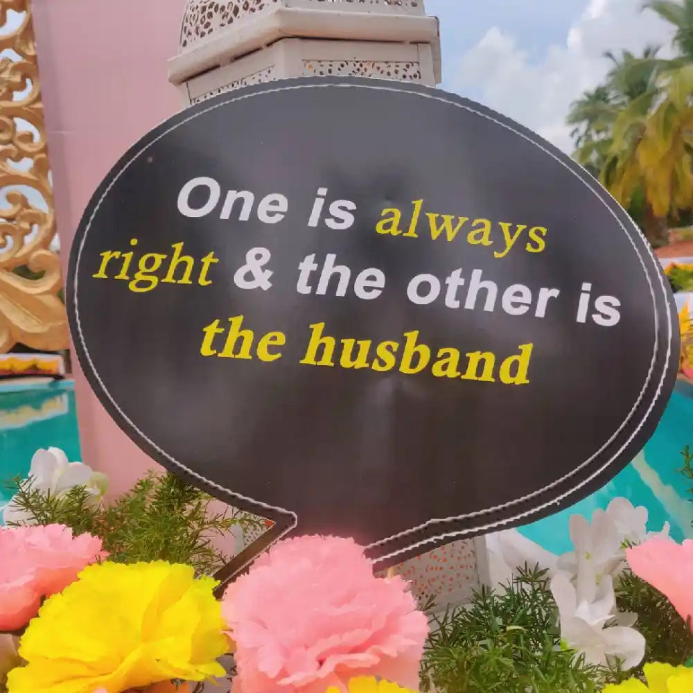Get Elegant Floral Wedding Decor with a creative wedding sign and floral arrangement