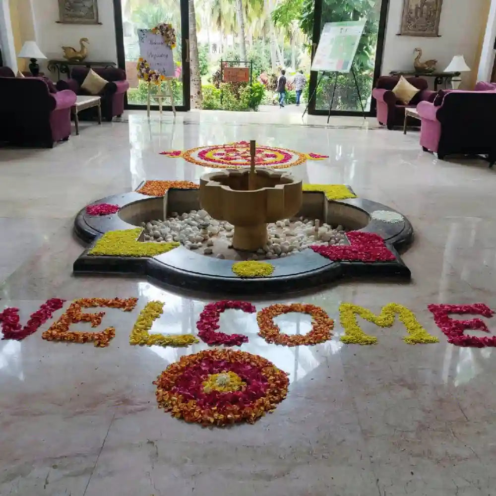 Get Elegant Floral Wedding Decor with colourful floral rangoli decoration
