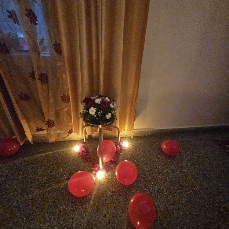 Get a quote for first night floor decoration with flowers, balloons and candle lights