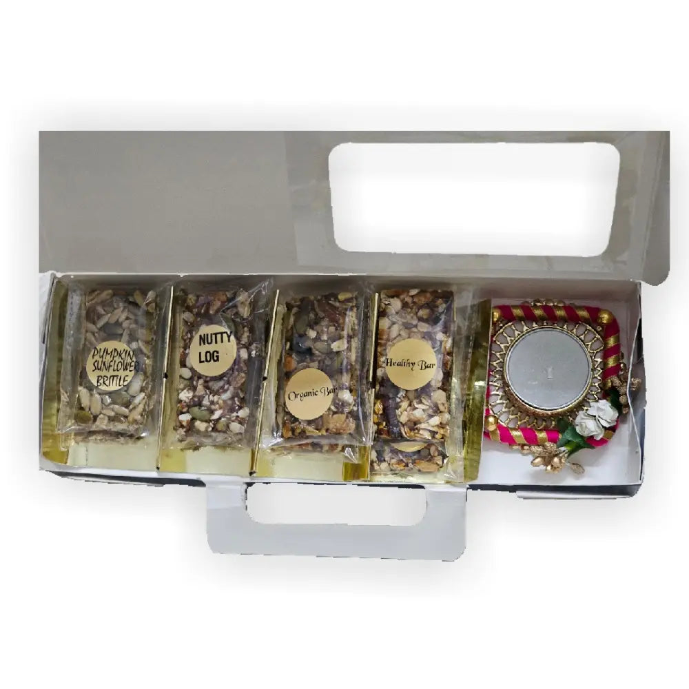 Shop Diwali gift box with snack bars and a tea light holder