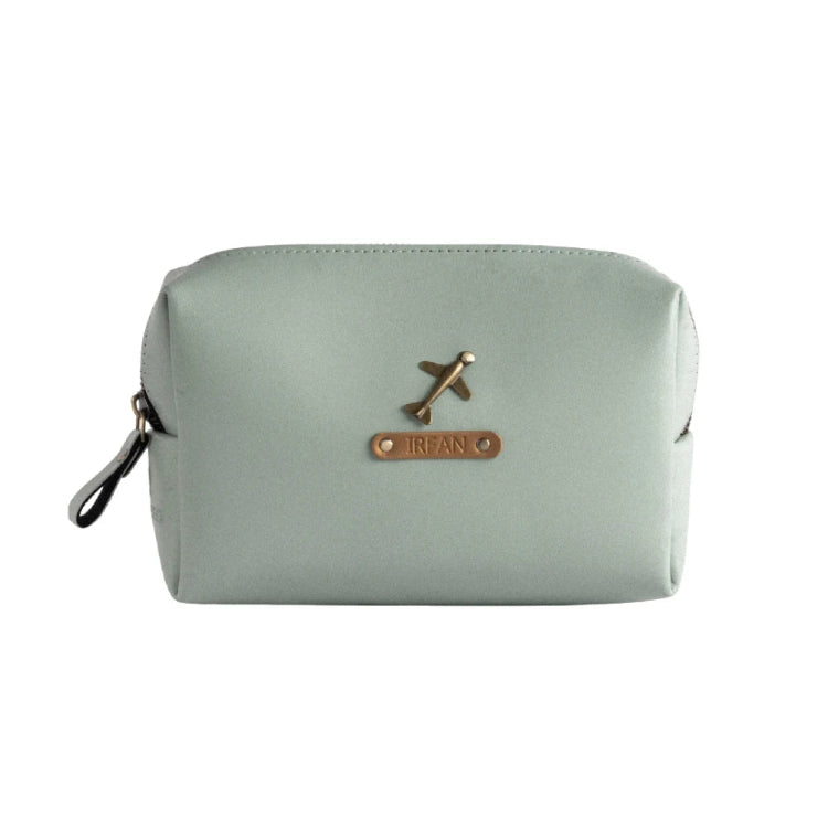 Buy customized travel pouch in mint with airplane charm and personalized name tag