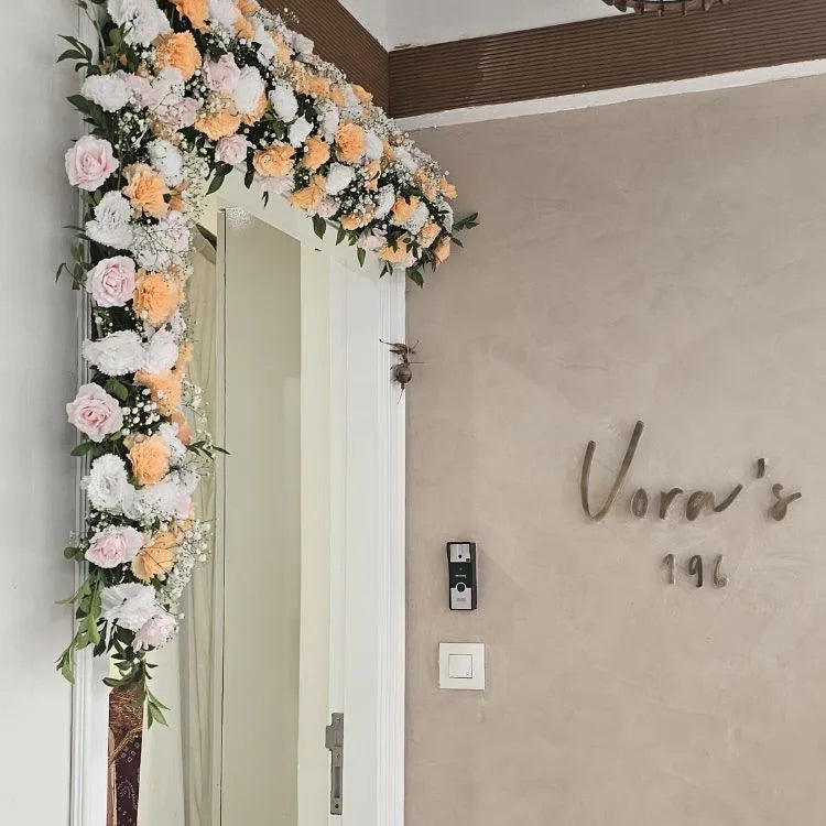 Enquire about modern floral entrance decoration with roses and carnations