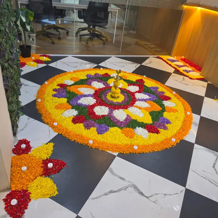 Book Onam Pookolam Office Decoration with Floral Rangoli and Brass Lamp