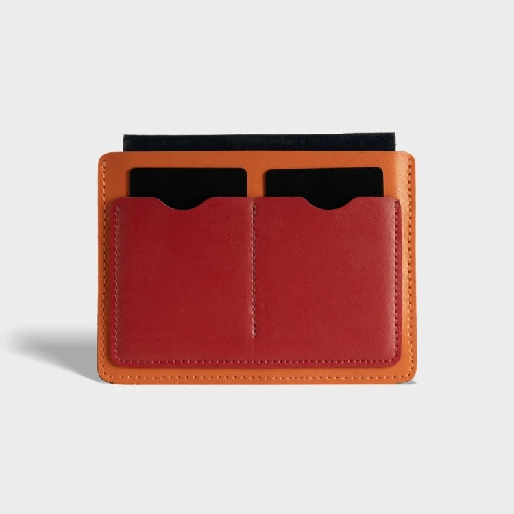 Shop orange passport sleeve with inner card pockets