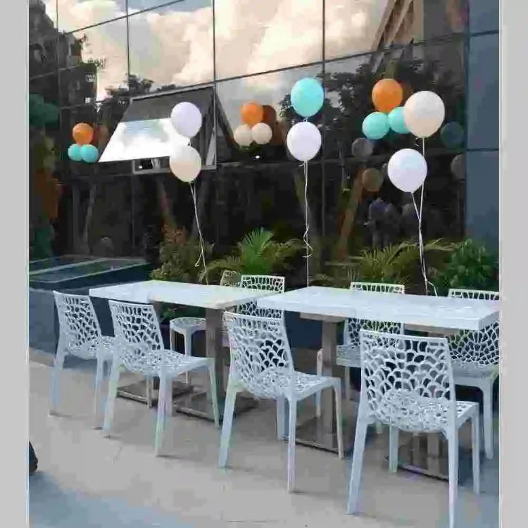 order pastel birthday venue decor with colourful balloon bunches