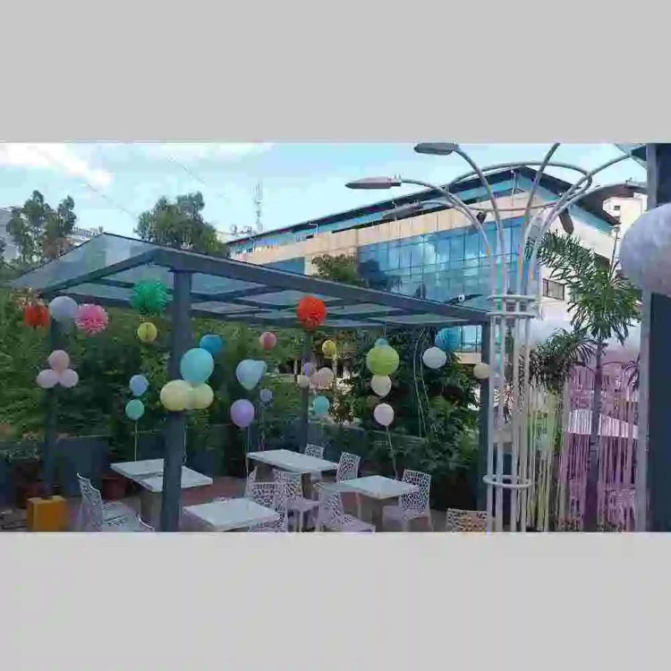 get pastel birthday venue decor with colourful balloon decoration