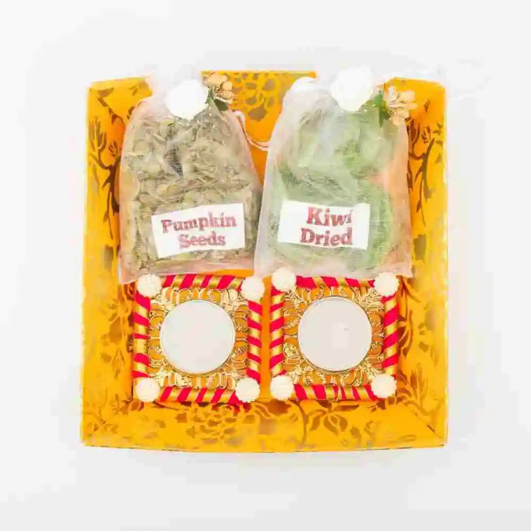 Order Diwali Gift Hamper with Pumpkin Seeds Dried Kiwi and Tea Light Holder