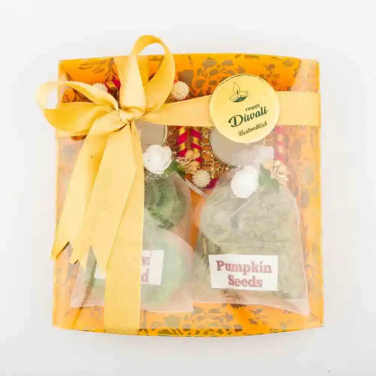 Order Pumpkin Seed and Dry Kiwi Diwali Hamper with Decorative Tea Light Holder