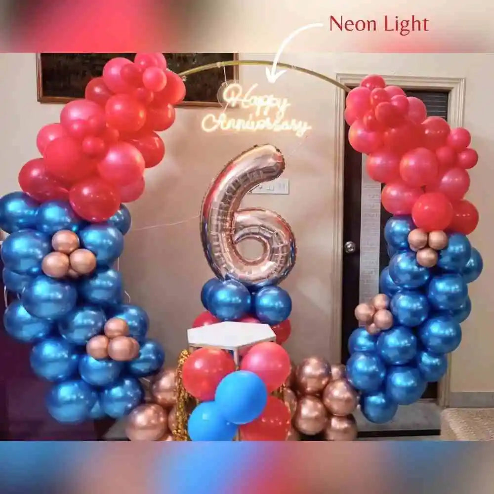 Book red and blue Anniversary Balloon and Foil Decor at Home with neon light