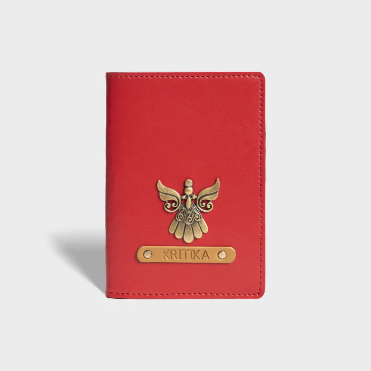Shop red personalized passport cover with angel charm and name