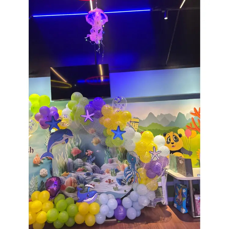 Order Underwater World Birthday Decor with colorful ocean-themed balloon arch and sea life backdrop