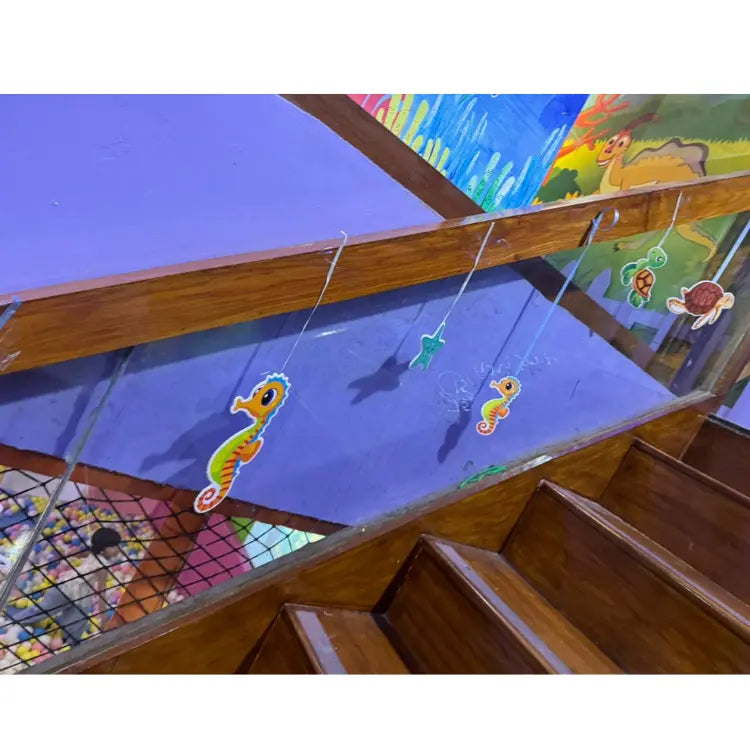 Get Underwater World Birthday Decor with hanging seahorse and sea life decorations