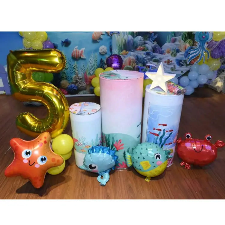 Get Underwater World Birthday Decor with hanging jellyfish and ocean-themed balloon decorations