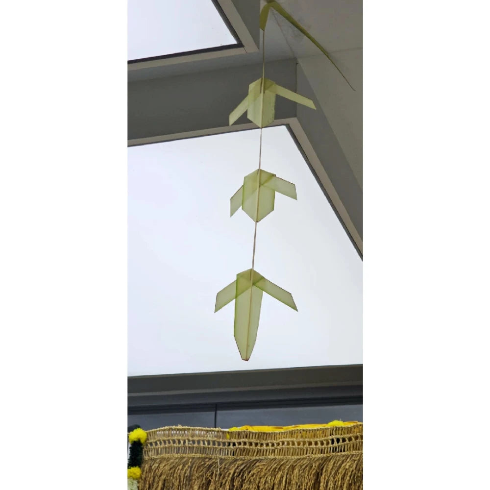 Book Yellow Pongal hanging leaf decoration for an office festive setup